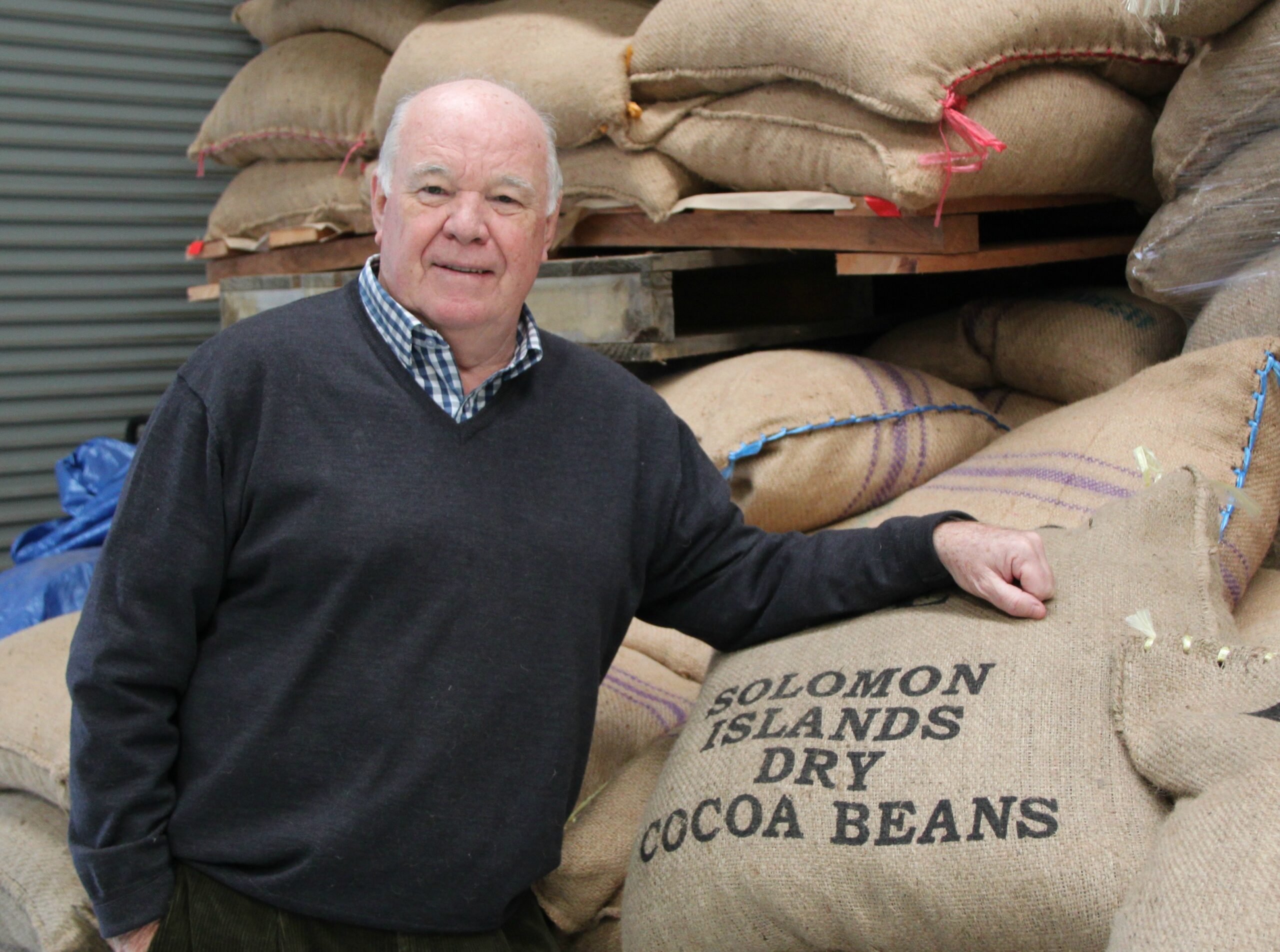 Clive Carroll of Solomons Gold NZ with premium grade cacao beans